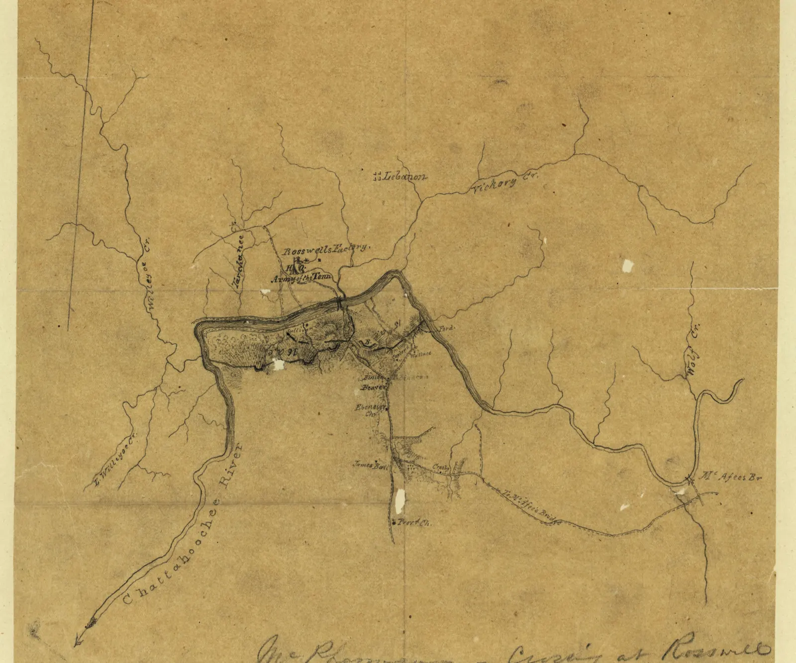 A hand-drawn manuscript map in brown ink on aged tan paper with fold creases and stains, showing the winding Chattahoochee River with tributaries labelled including "Vickory Cr." and "Willeo Cr.". Hatched marks near the river bend are labelled "Roswell Factory" and "Army of the Tenn.", and roads lead to places such as "Mt. Lebanon". A handwritten caption at the bottom reads "McPherson - Crossing at Roswell", with a "Map Division, 1 Jun 1955, Library of Congress" stamp and "Sherman #104" in pencil.
